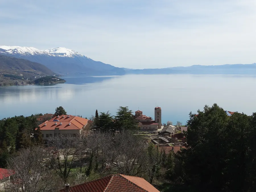 The Church of St. John at Kaneo above Lake Ohrid, with snow on the mountains across the water